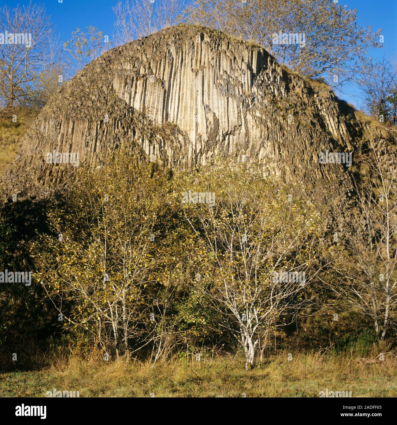 Weathered columnar basalt formation. Columnar basalt is formed by rapid