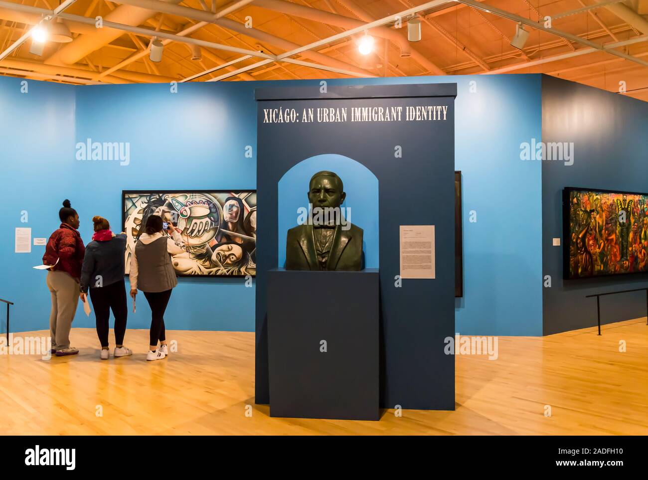 People looking at an Artwork by a Mexican artist in the National Museum ...