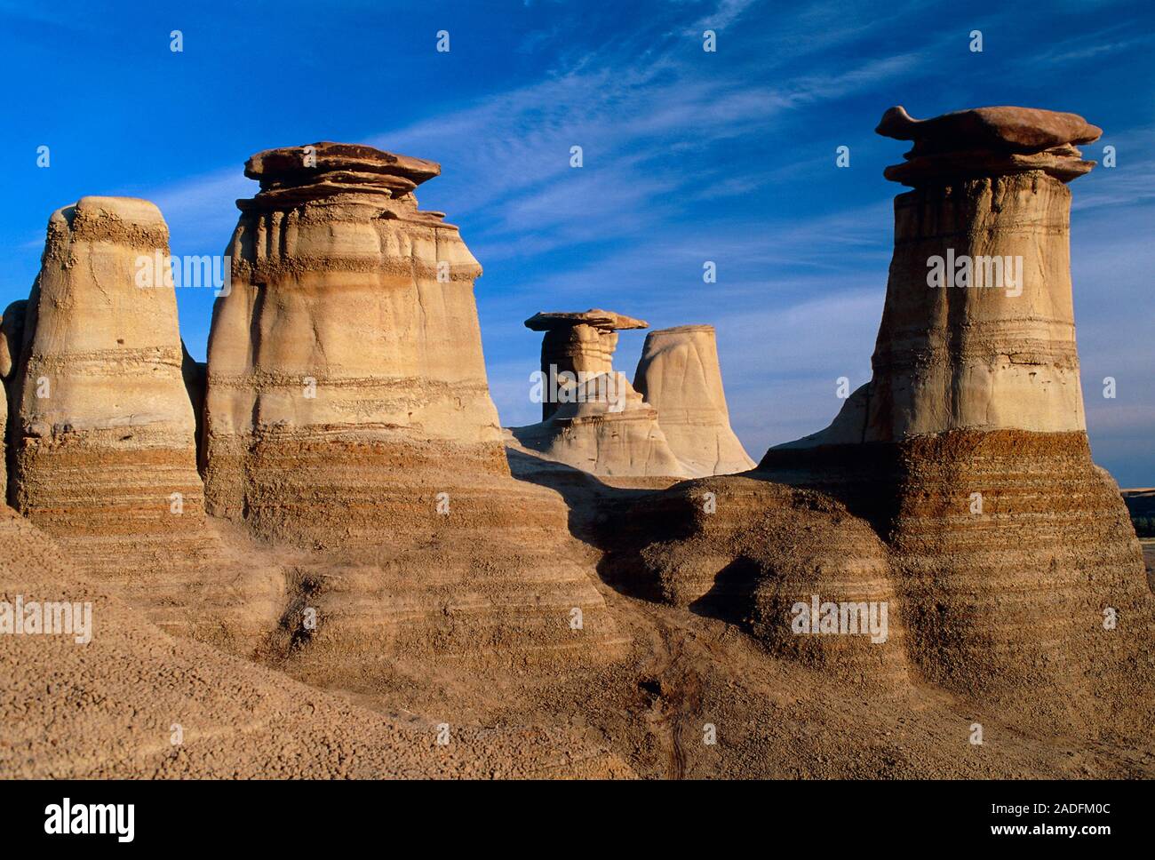 Earth pillars. Pillars of soft, sedimentary rock topped by flat caps of
