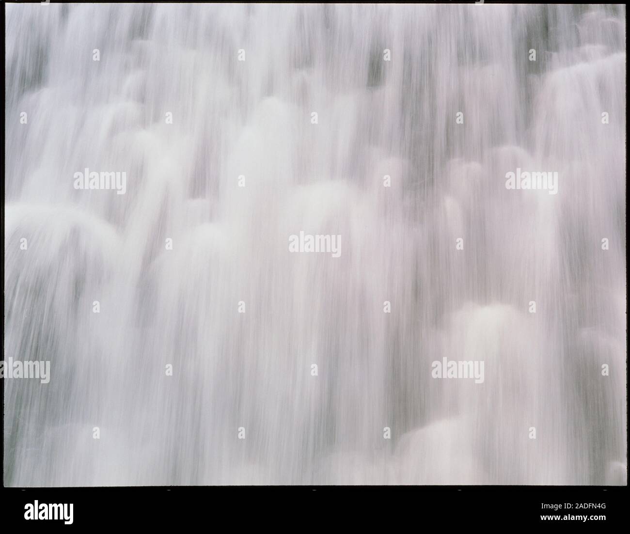 Cascade of water in an artificial waterfall. The streamer-like appearance of the water is due to the long exposure time used. Photographed in Las Vega Stock Photo