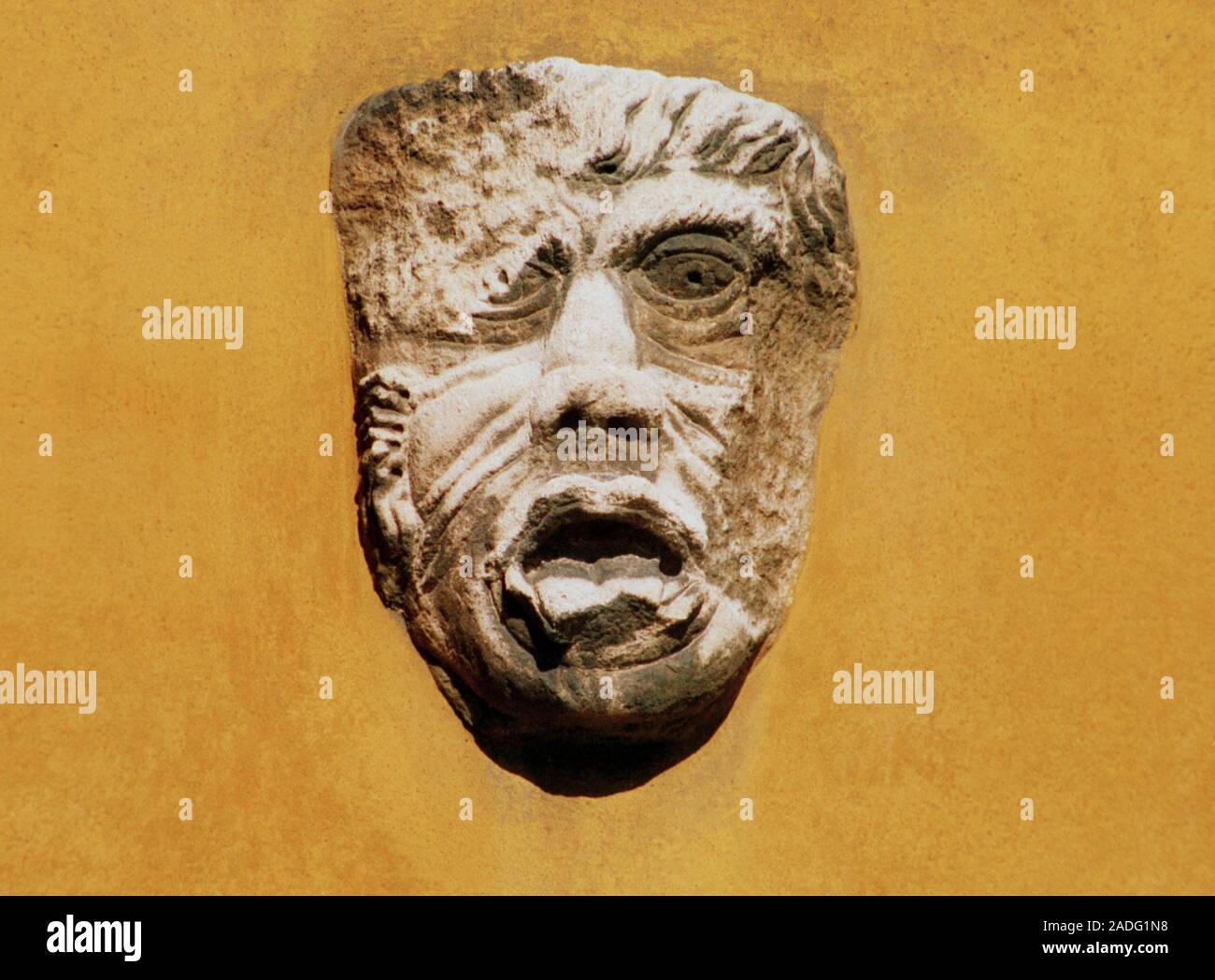 Acid rain erosion. Statue (basrelief) eroded by acid rain. Acid rain