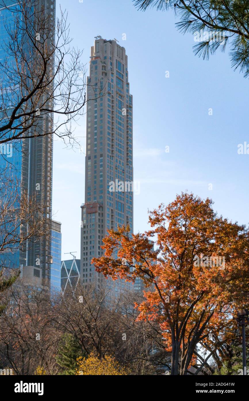 Central Park in the Fall with 220 Central Park South in background, NYC, USA  2019 Stock Photo