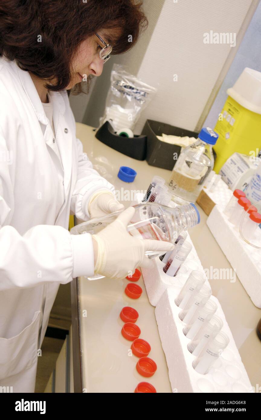 DNA extraction. Image 1 of 10. adding a lysis solution to a