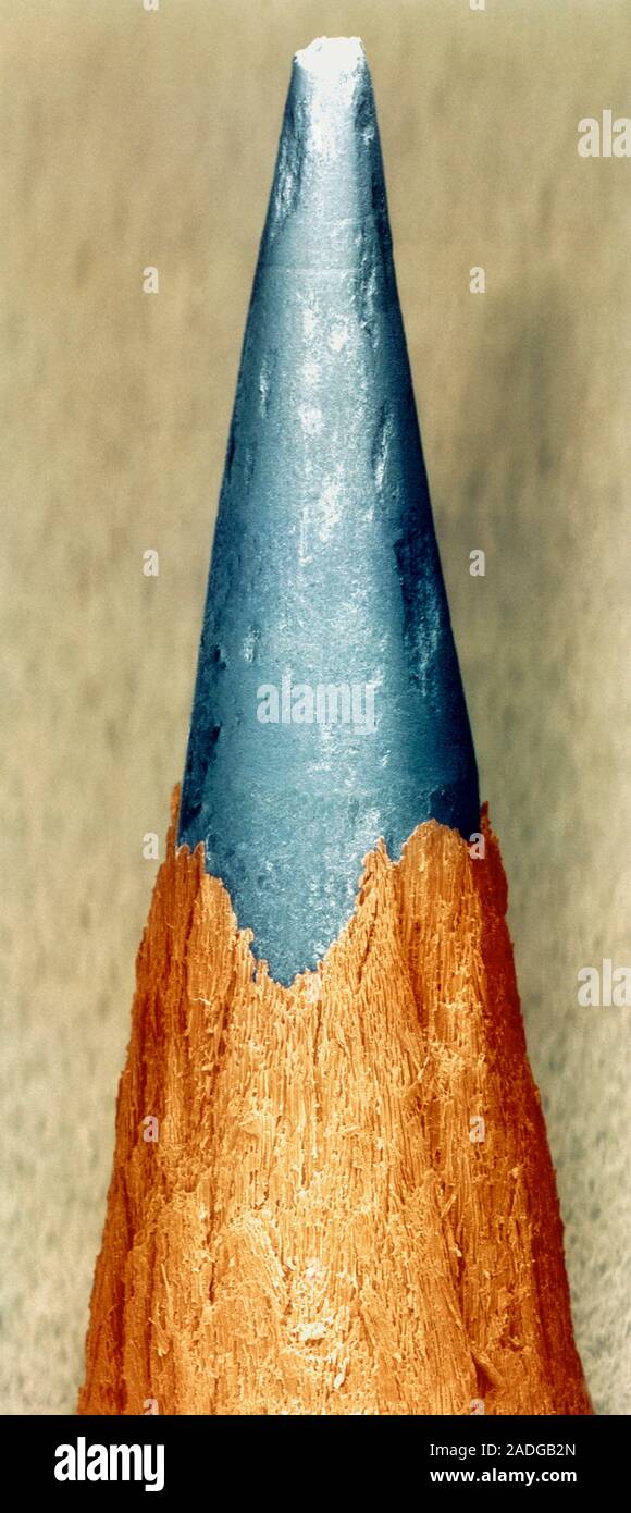 Pencil. Coloured scanning electron micrograph of a sharpened pencil ...