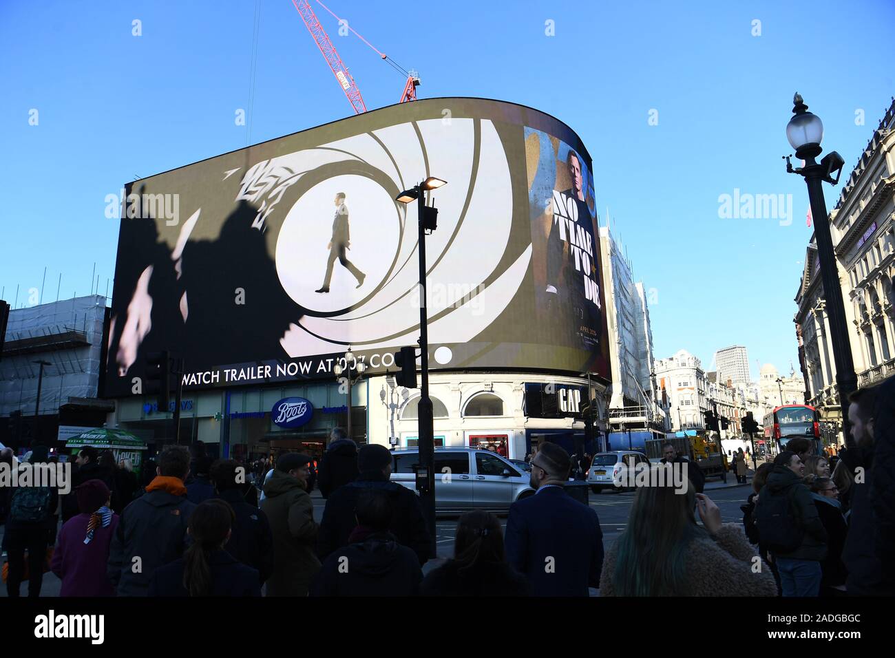 The trailer for the latest Bond film 'No Time to Die' is aired for the first time on the large screen in London's Piccadilly Circus. Stock Photo
