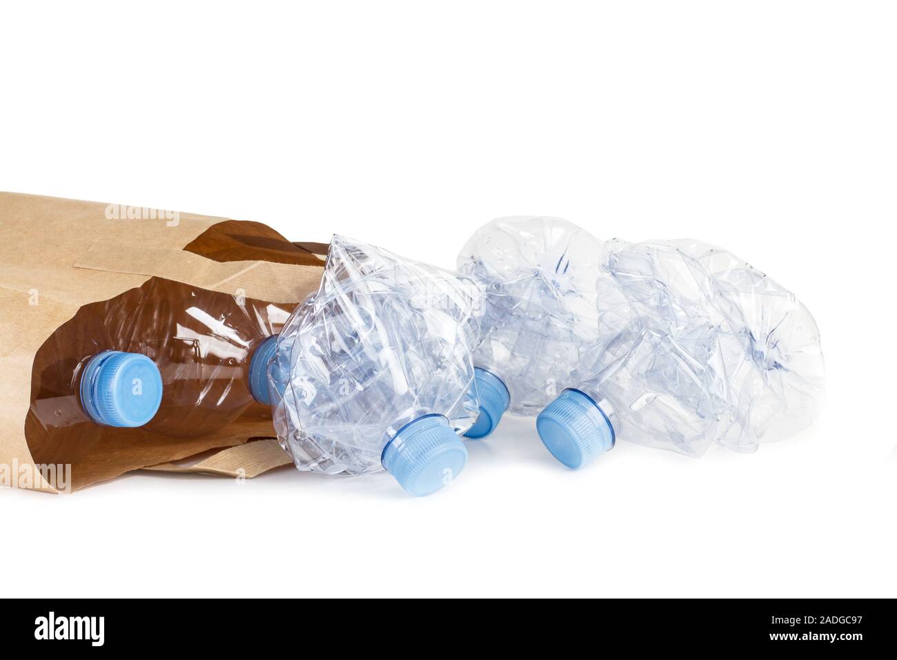 Empty plastic bottles in a brown paper bag Stock Photo