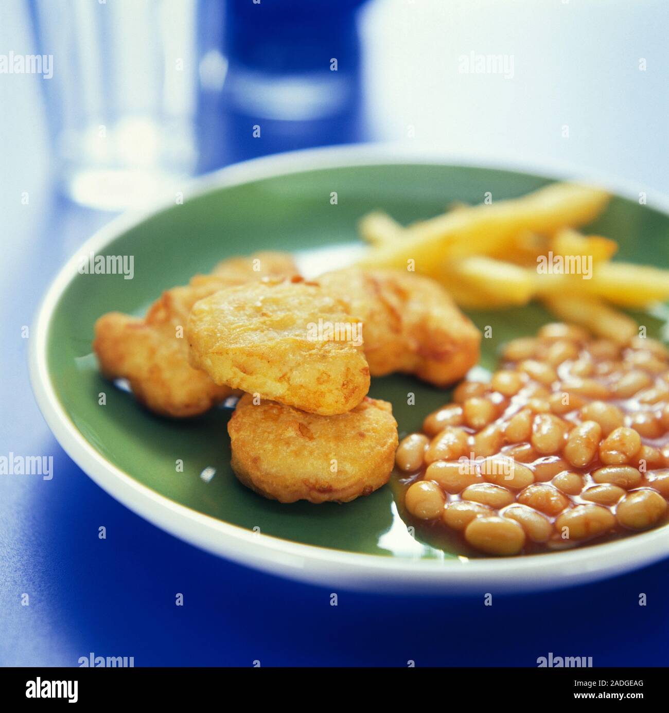 Kids' meal of chicken nuggets, chips and baked beans Stock Photo Alamy