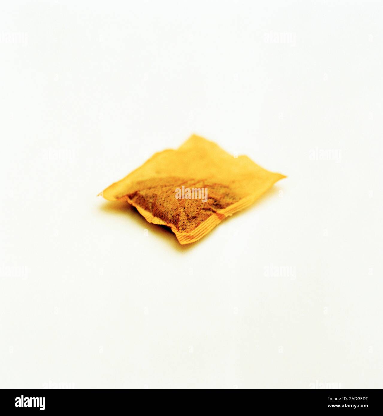 Tea bag, perforated with holes through which chemicals from the tea