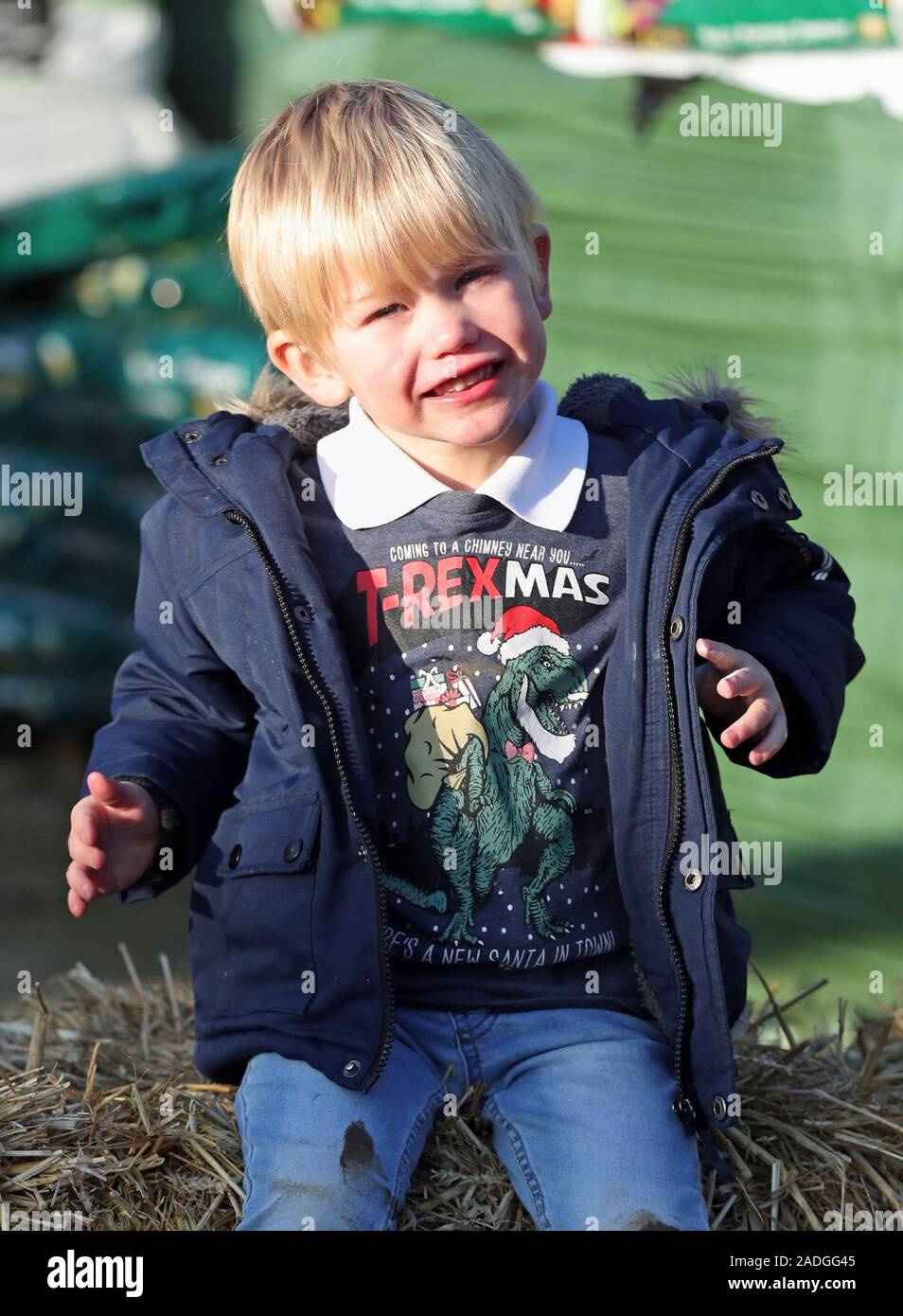 Freddie Rusbridge who managed to 'photo bomb' the Duchess of Cambridge as she took part in Christmas activities with families and children who are supported by the Family Action charity, during a visit to the Peterley Manor Farm in Buckinghamshire. Stock Photo