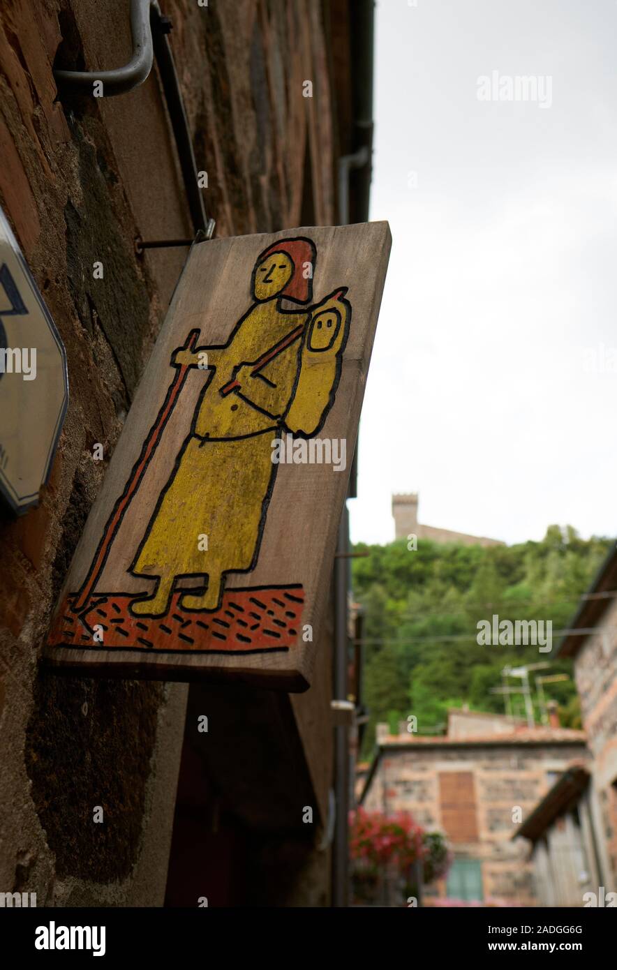 A home made painted sign marking the historic pilgrimage walking route of the Via Francigena to Rome in Radicofani Tuscany Italy EU Stock Photo