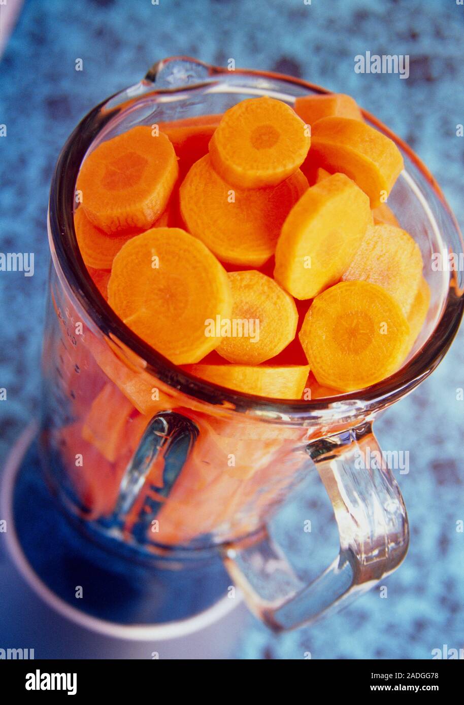 Chopped carrots (Daucus carota) in a blender Stock Photo Alamy