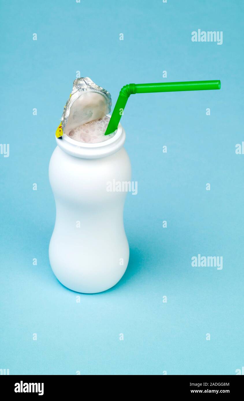 Prebiotic and probiotic yoghurt drink with a straw. This yoghurt drink