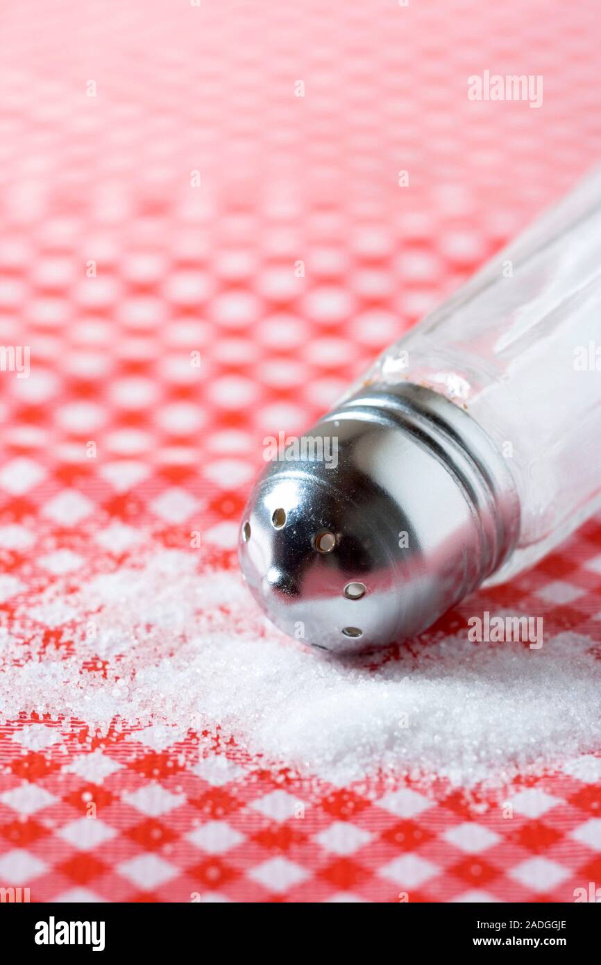 Table salt spilling from a salt cellar Stock Photo Alamy