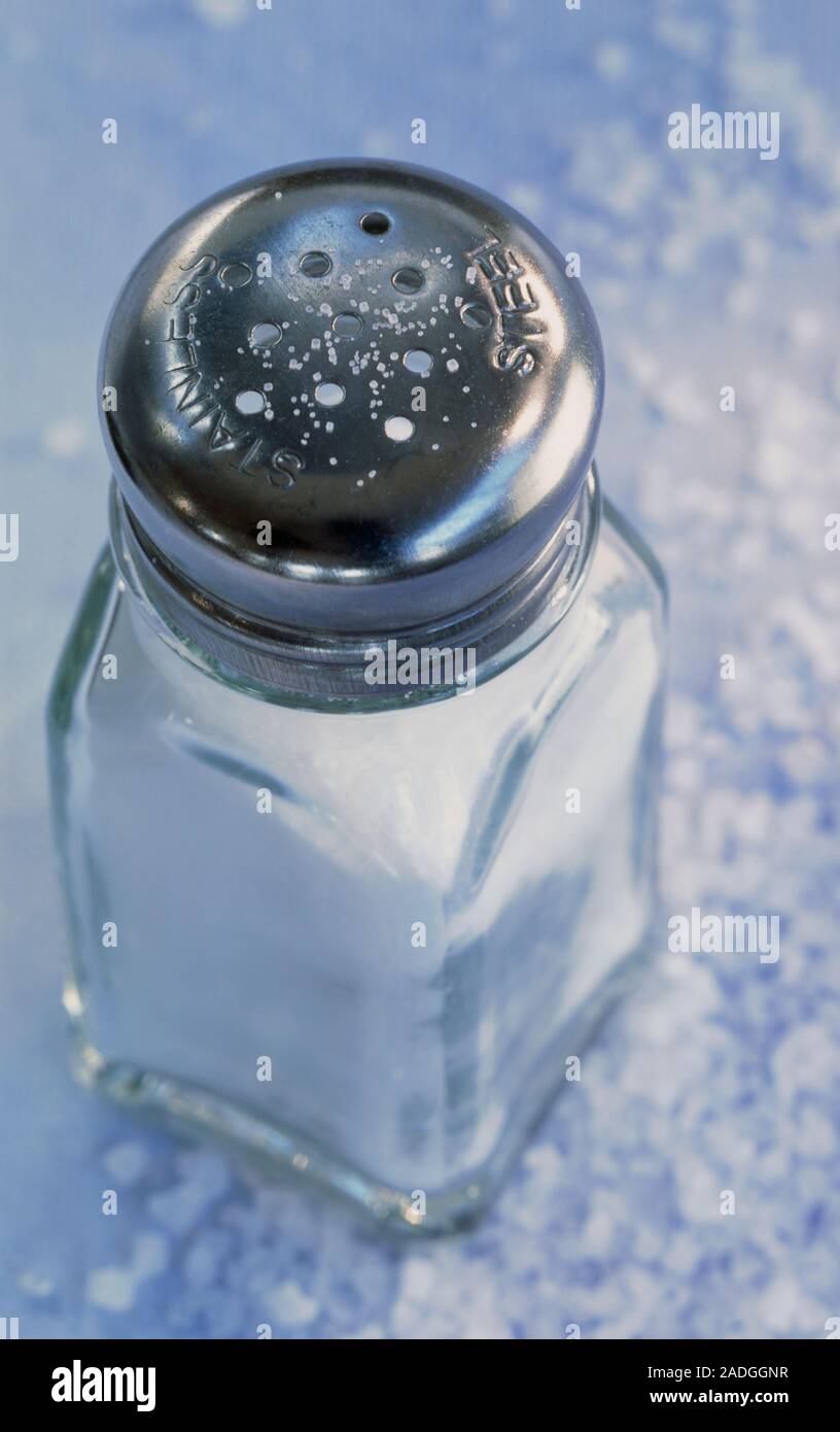 Salt cellar. Salt, or sodium chloride, in a salt cellar. Salt is used