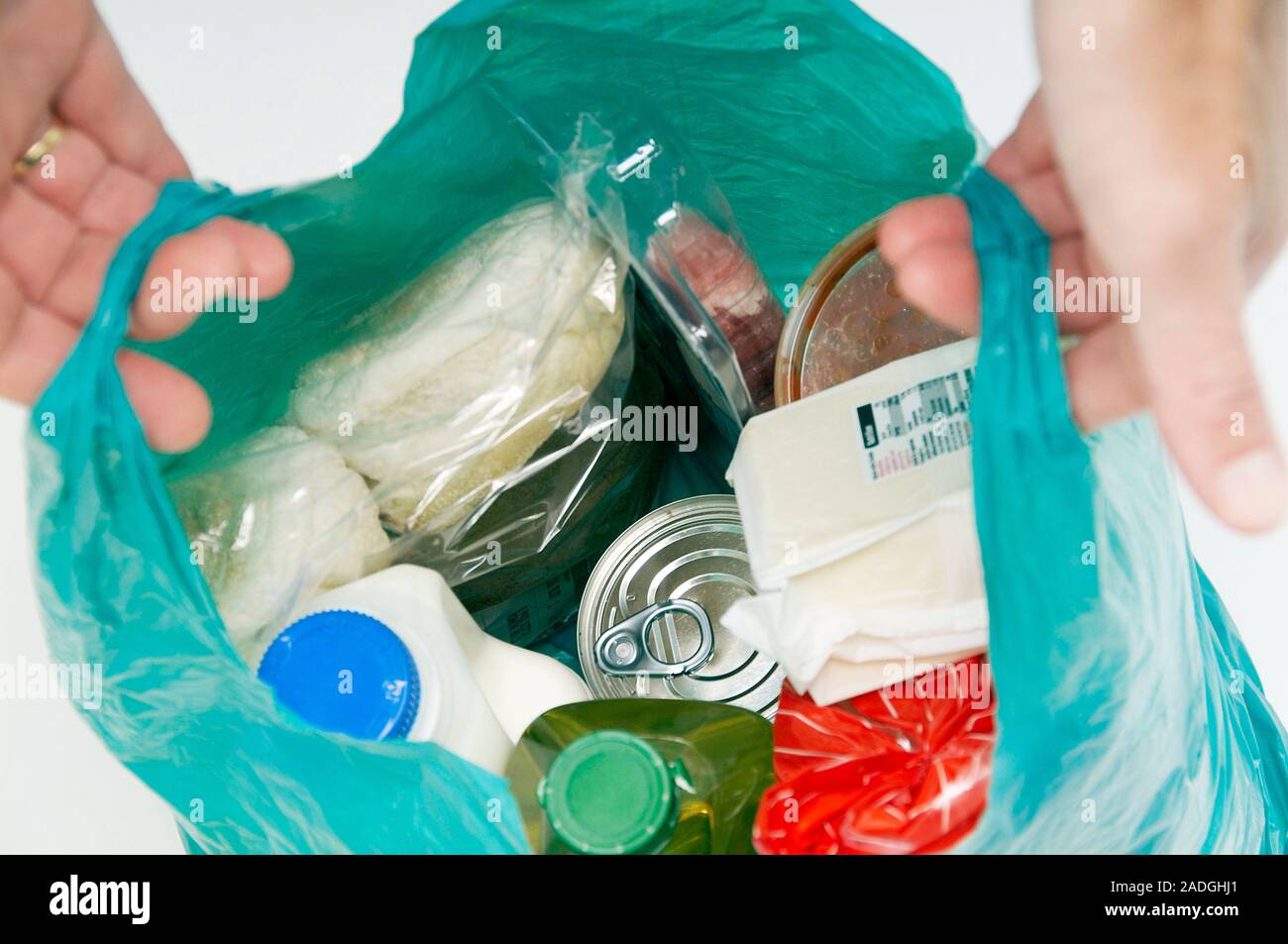 Packaged food in a plastic shopping bag Stock Photo - Alamy