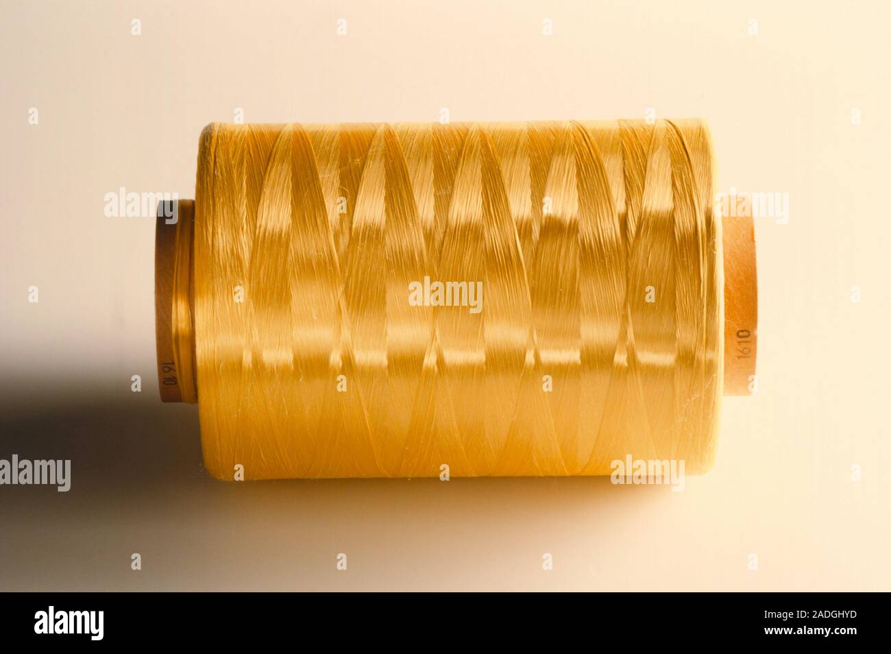 Reel of thread. Reel with aramide thread wound around it. Aramide is a