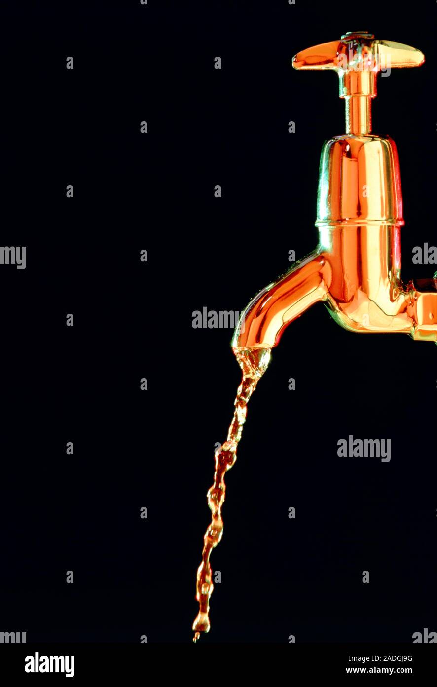 Water flowing from a tap Stock Photo - Alamy