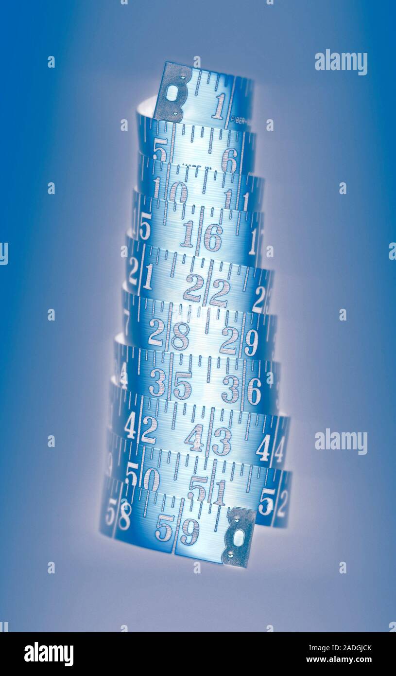 Tape measure. Rolled tape measure marked in inches Stock Photo Alamy