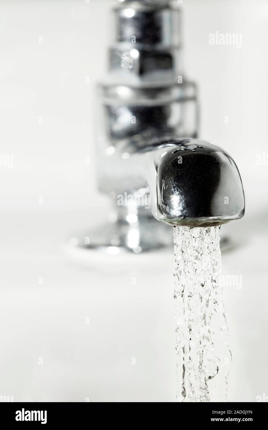 Tap water. Highspeed photograph of water flowing from a tap Stock