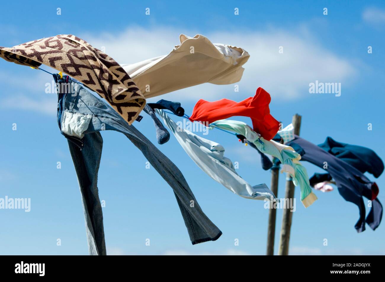 Washing hanging out to dry on a windy day Stock Photo Alamy