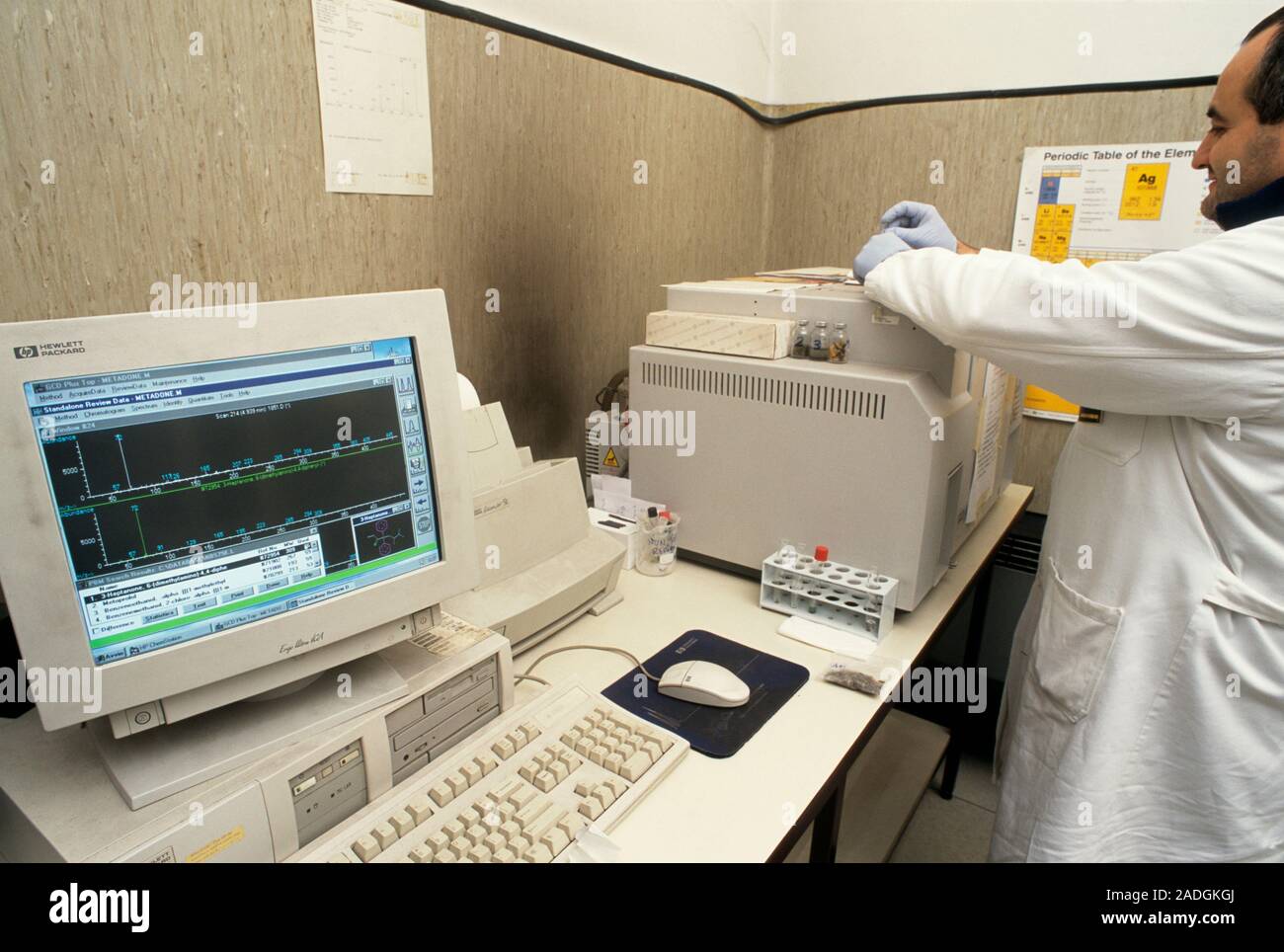 Mass spectrometer being used by a forensic scientist. He is preparing a