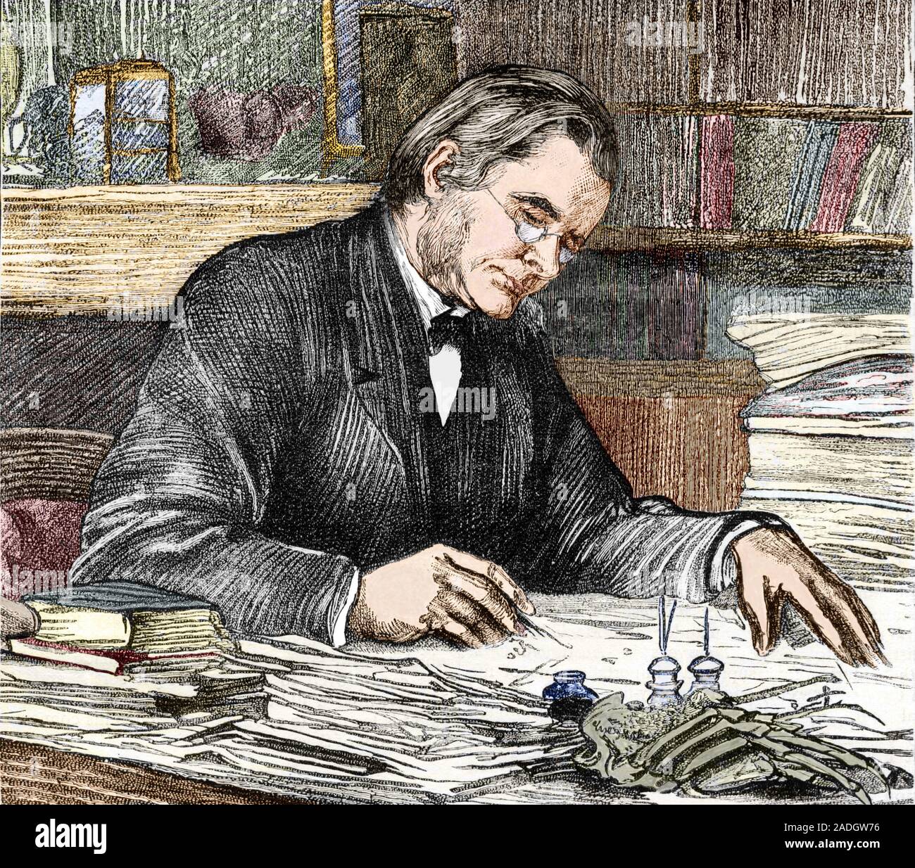 Thomas Henry Huxley (18251895), British biologist, working at his desk