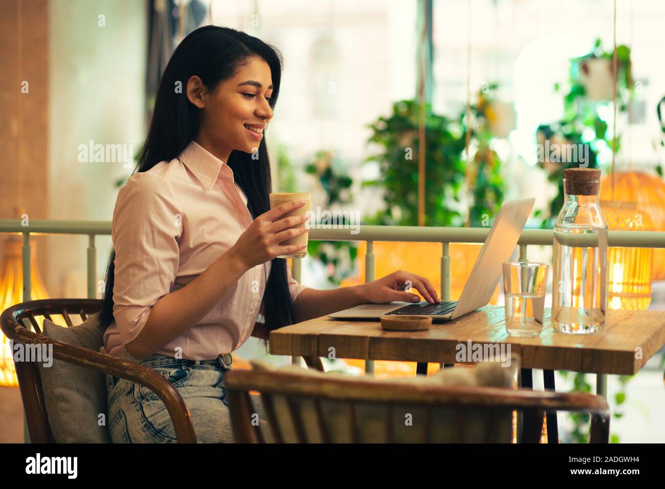 Happy lady student laptop hi-res stock photography and images - Alamy
