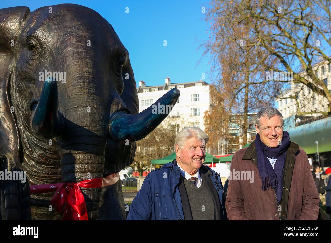 Marble Arch. London, UK 4 Dec 2019 - Parliamentary Conservative candidate for Richmond Park and North Kingston and former Tory candidate for Mayor of London Zac Goldsmith (L) and author and father of the Prime Minister Boris Johnson, Stanley Johnson (R) stand in front of a bronze elephant at Marble Arch. The sculpture is the largest such depictionÊof an elephant herd in the world and is intended to draw attention to the plight of this species that could be extinct on current trends, by 2040. Credit: Dinendra Haria/Alamy Live News Stock Photo