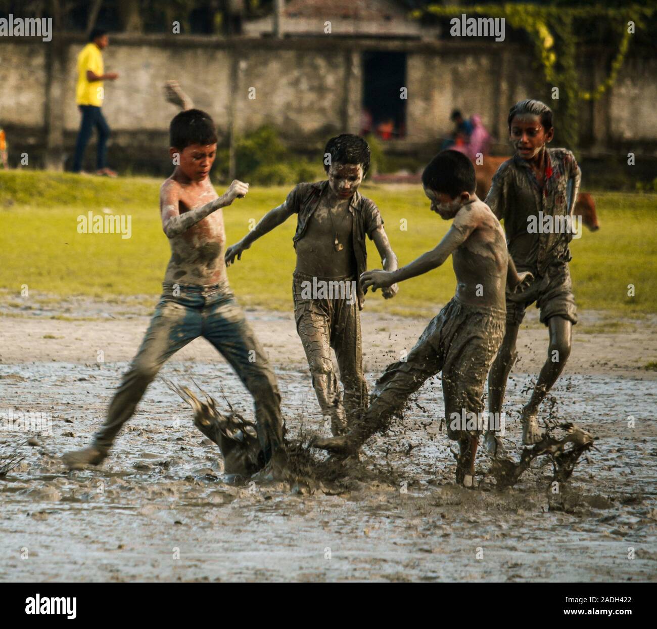 Kids Playing In The Mud