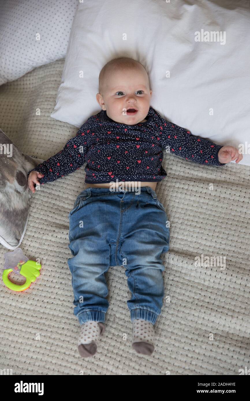 babies wearing jeans
