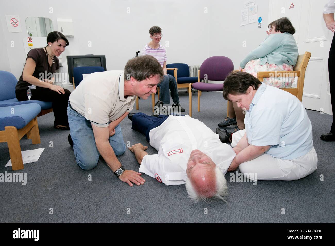 MODEL RELEASED. Disabled people learning first aid. British Red Cross ...