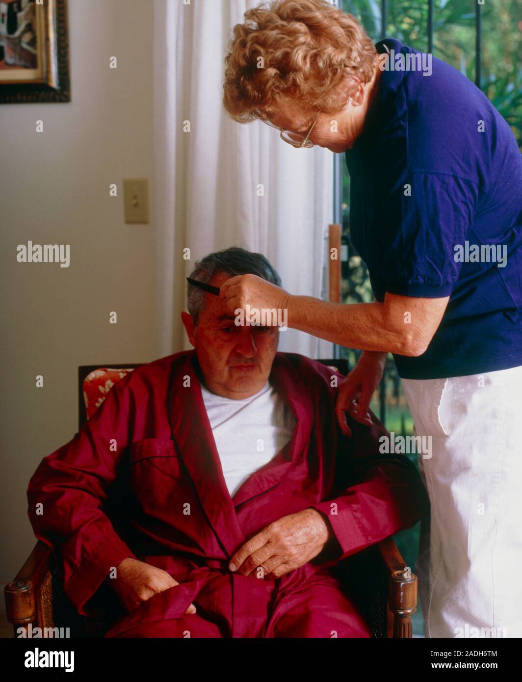 Alzheimer patient. An elderly man suffering from Alzheimer's disease