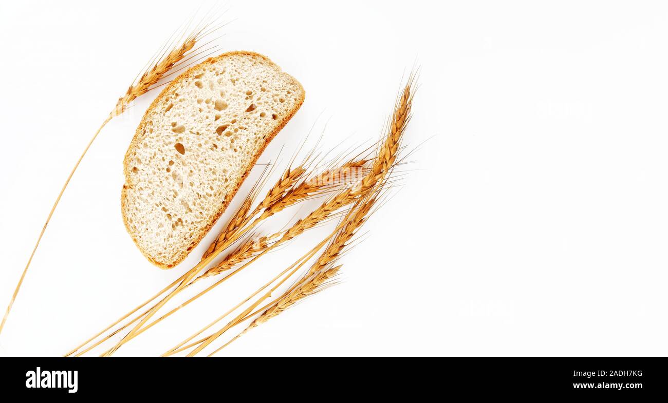 Photos Wheat Ears and bread isolated on a white Background Stock Photo ...