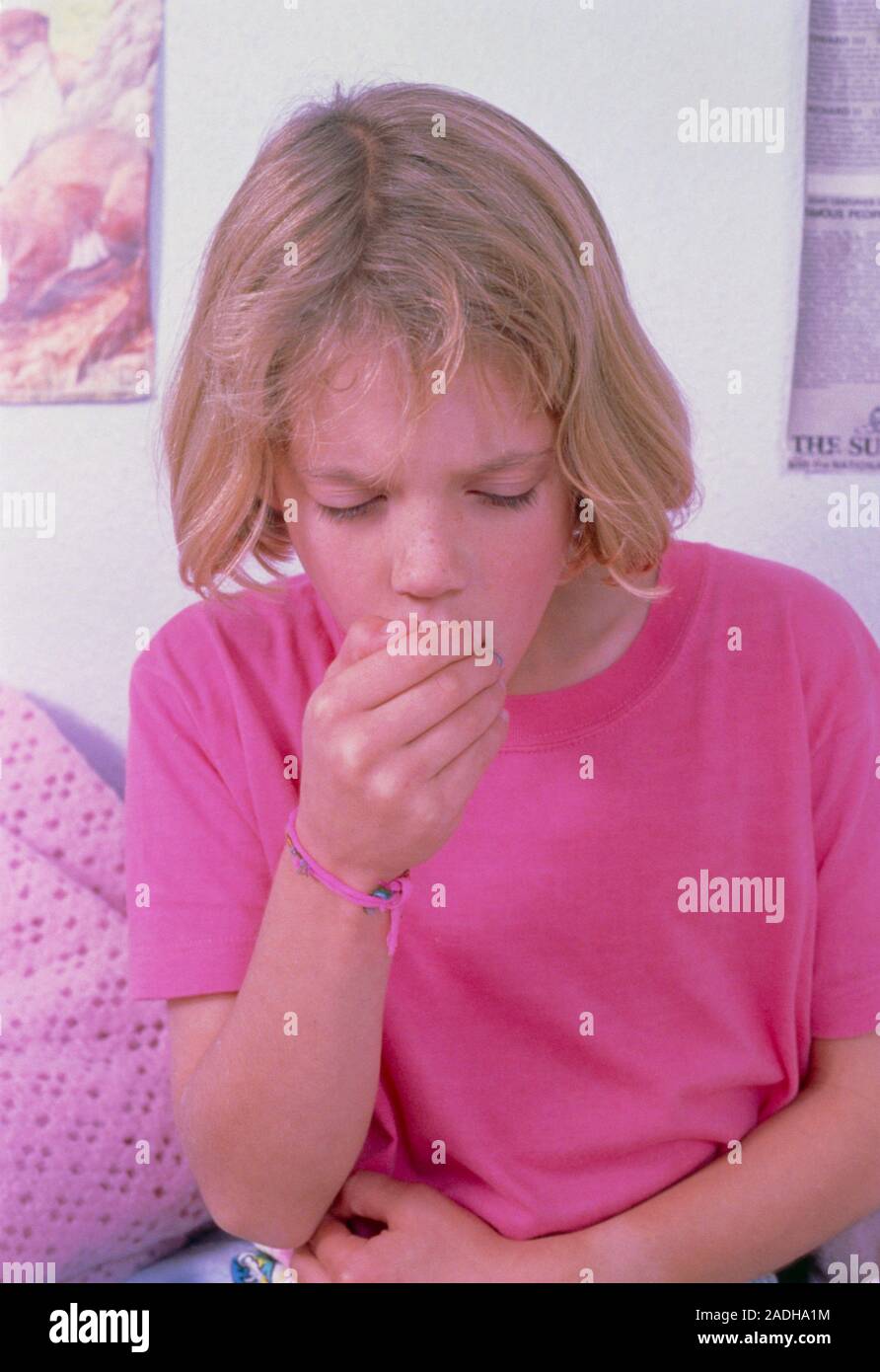 Model released. A ten year old girl coughing Stock Photo Alamy