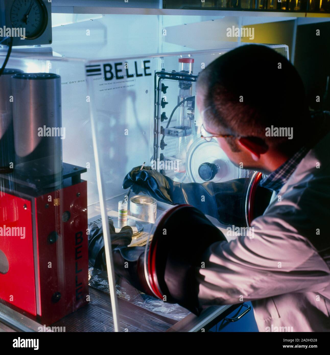 Kemo Box Method Glovebox use. Researcher using a glovebox during anticancer ...
