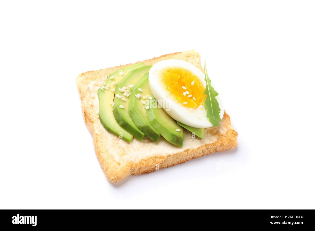 Toast with avocado and egg isolated on white background Stock Photo - Alamy