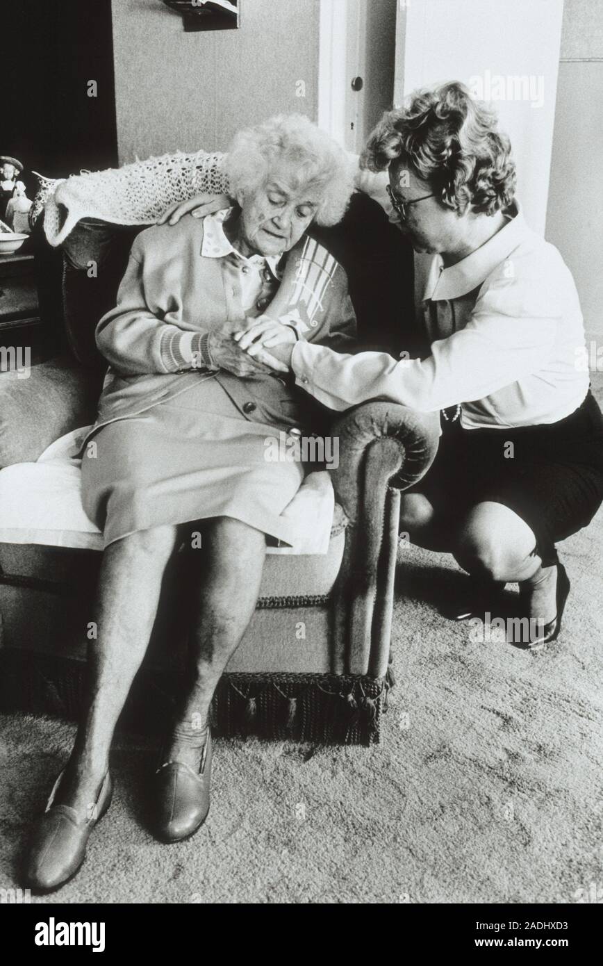 Senile dementia sufferer with her daughter. This substantial loss of ...