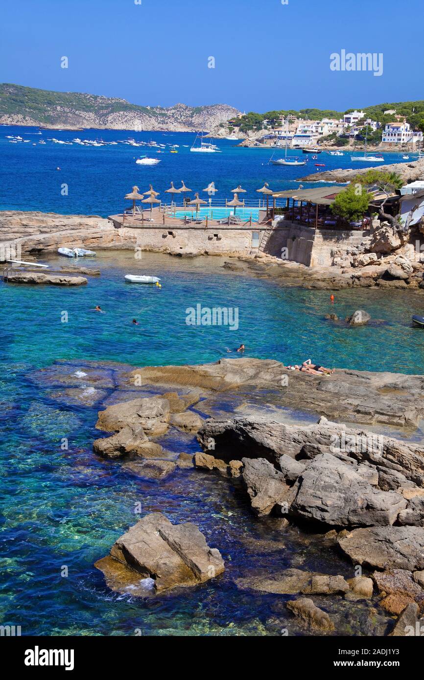 Rocky bathing bay with crystal clear water at San Telmo, Mallorca, Balearic islands, Spain Stock Photo