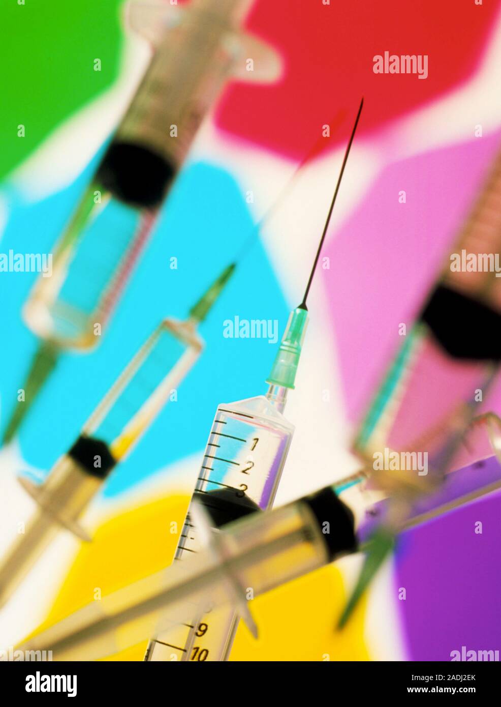 Syringes. Collection of hypodermic syringes with needles attached. Each