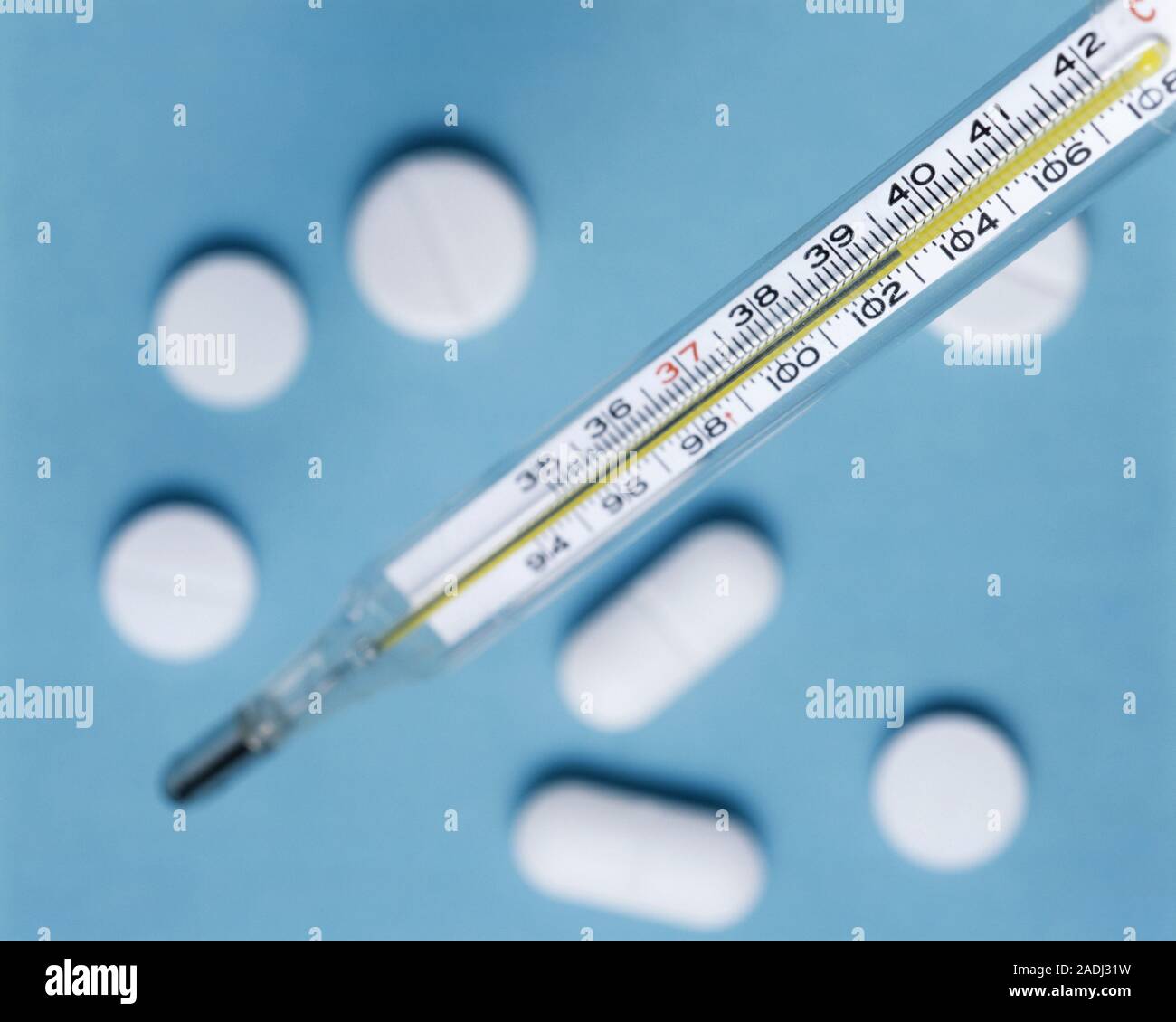 Fever. Mercury thermometer showing a raised temperature of 39.5 degrees Celsius. This indicates