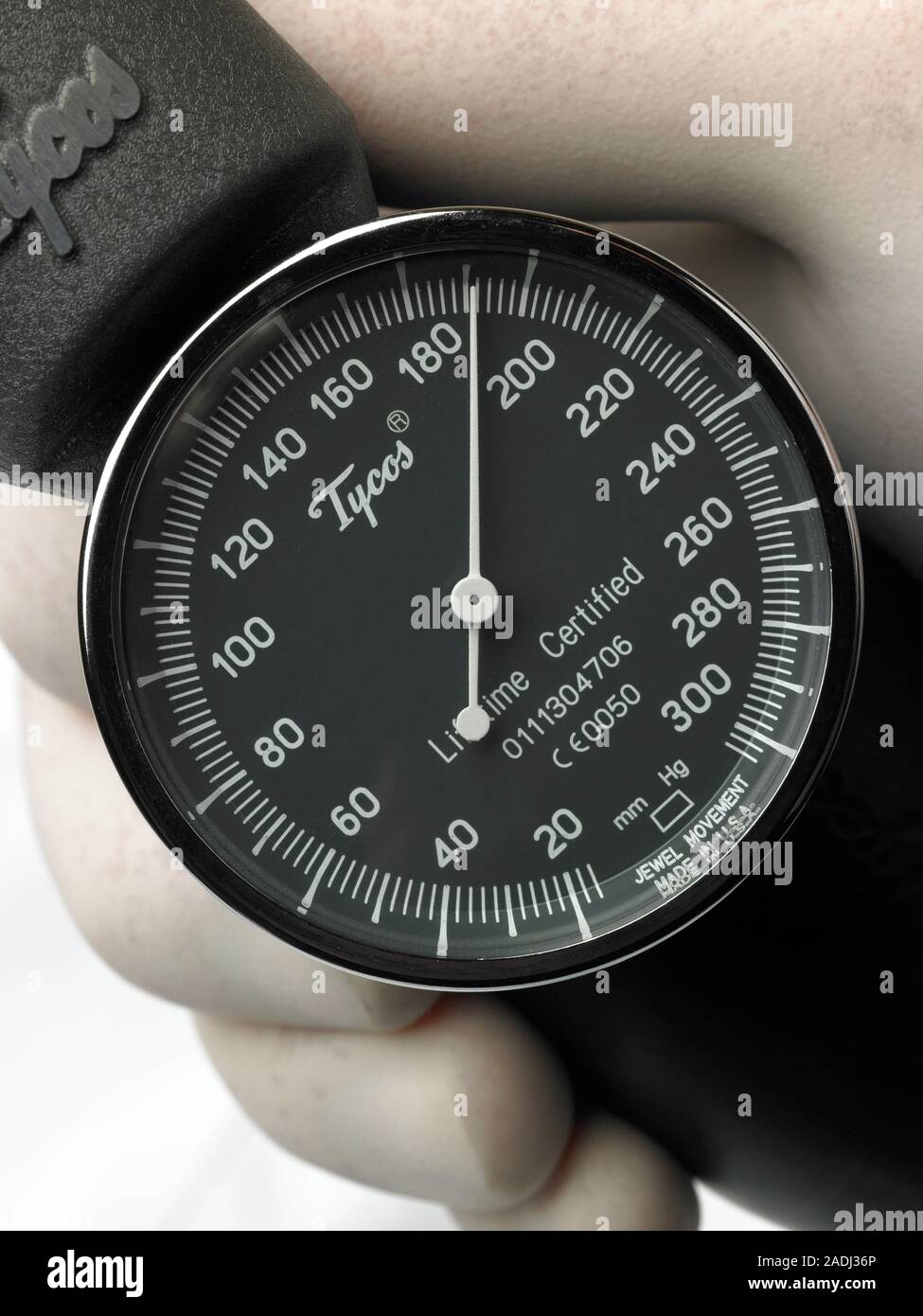Sphygmomanometer dial showing a high blood pressure reading Stock Photo