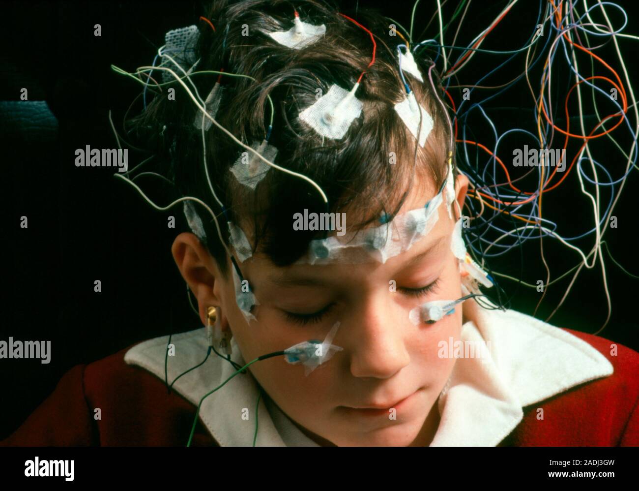 Young boy undergoing an Electroencephalograph (EEG) examination