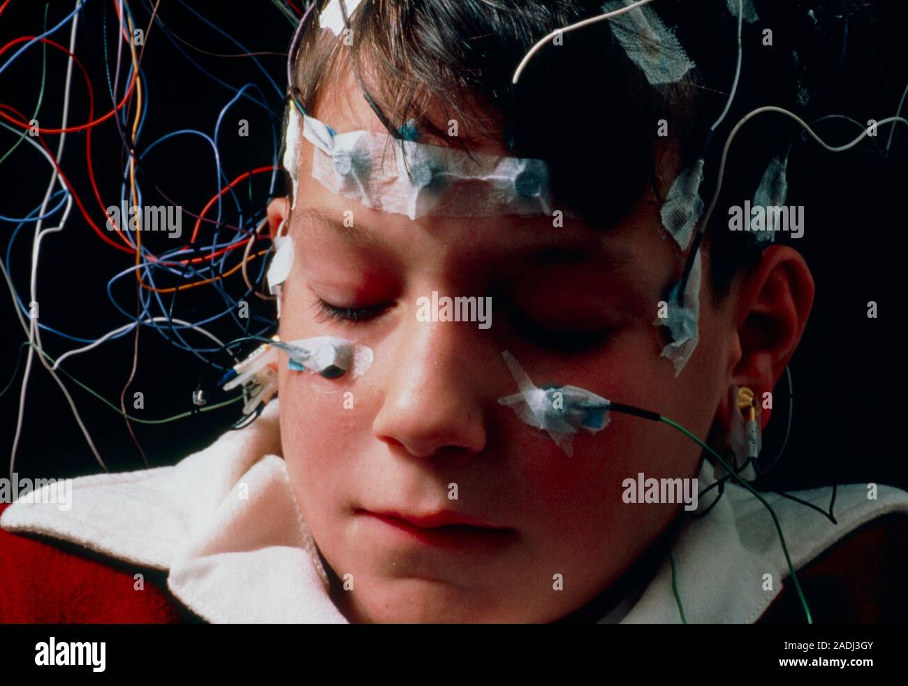 Young boy undergoing an Electroencephalograph (EEG) examination