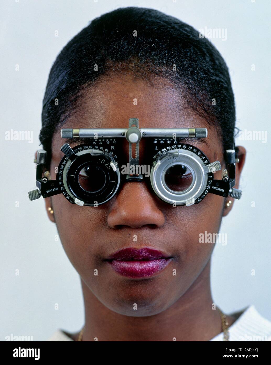Eye test. Ophthalmology test frames fitted to a teenage (16 year old