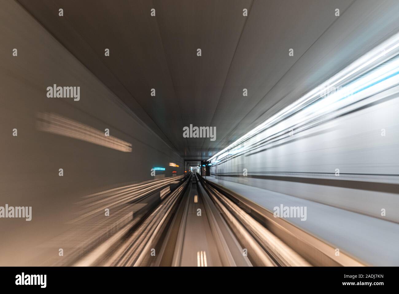 Blurred Motion Travel in train on tunnel Stock Photo