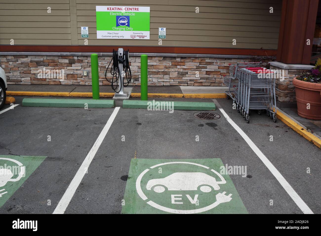 Parking spots ev charging station hires stock photography and images