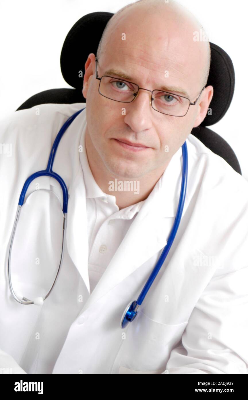 MODEL RELEASED. Doctor with a stethoscope round his neck Stock Photo ...