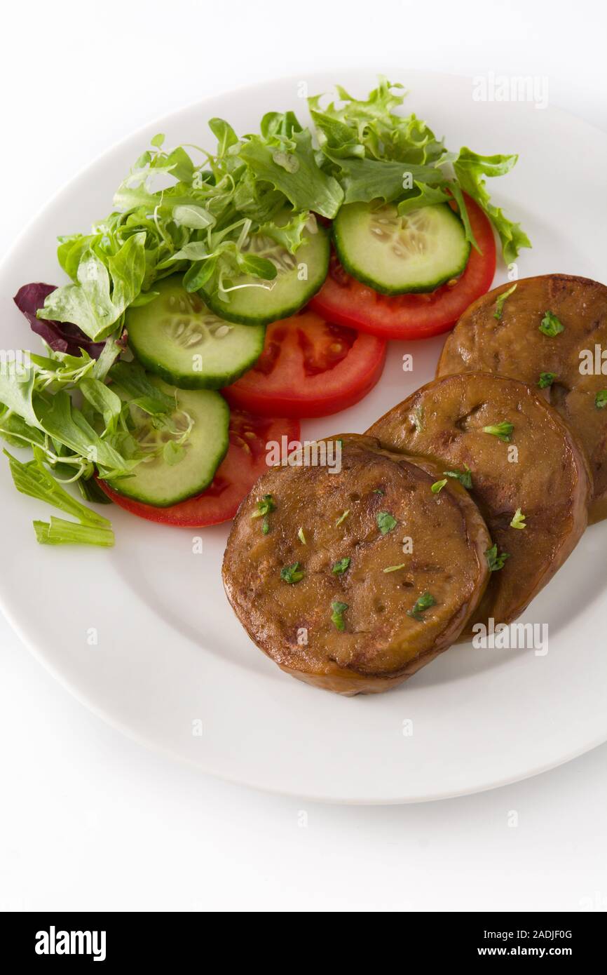 Seitan with vegetables isolated on white background. Fake meat Stock