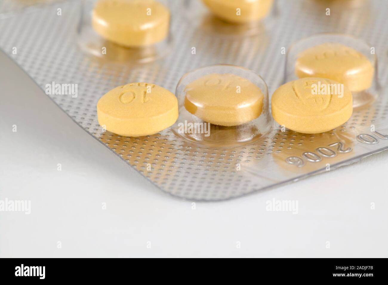 Morphine. 10mg tablets of slow release morphine sulphate (MST) tablets. The  tablets outside of the blister pack show the front of the capsule. The opi  Stock Photo - Alamy