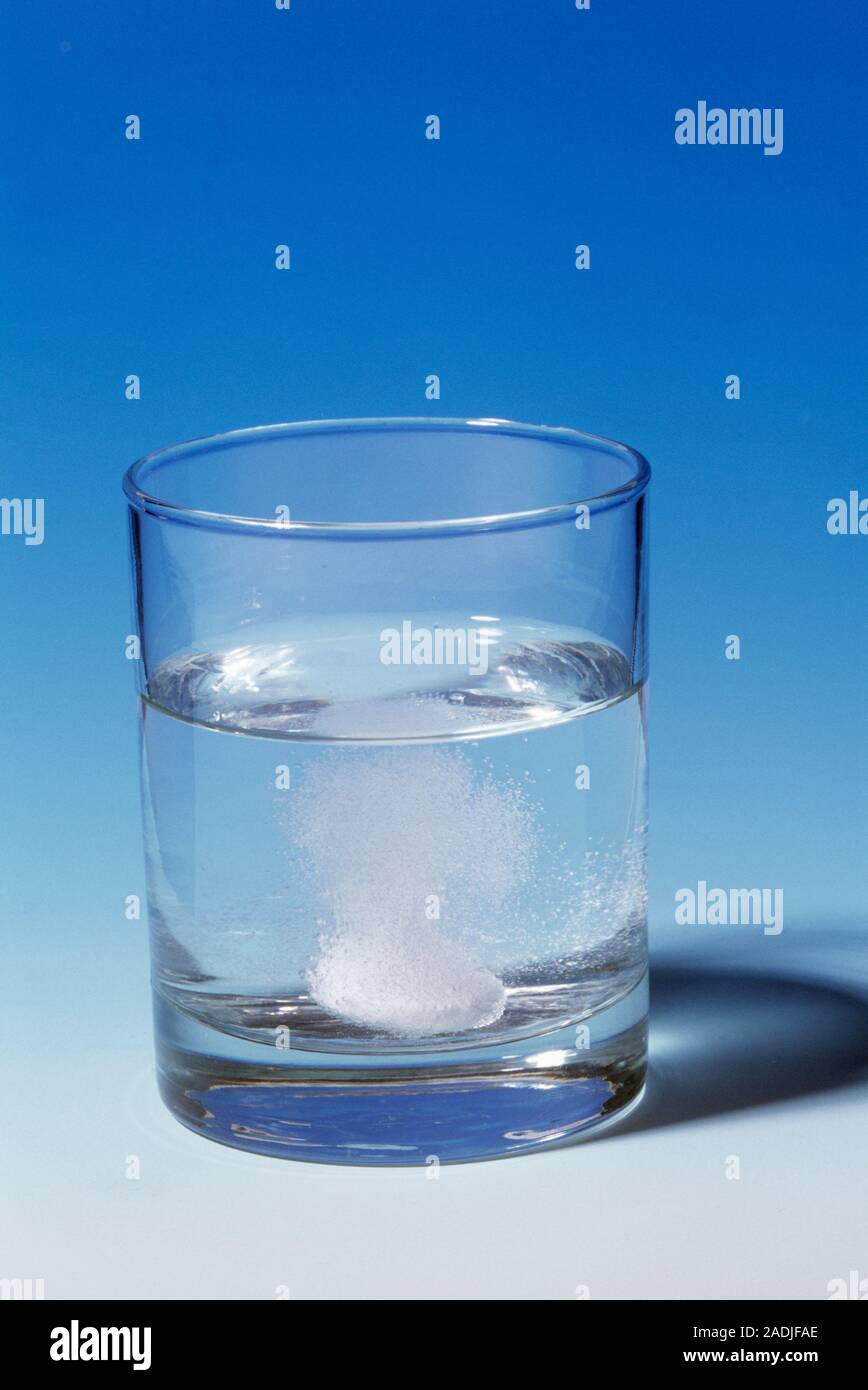 Indigestion tablet dissolving in water. This is an AlkaSeltzer tablet. It is a combination of